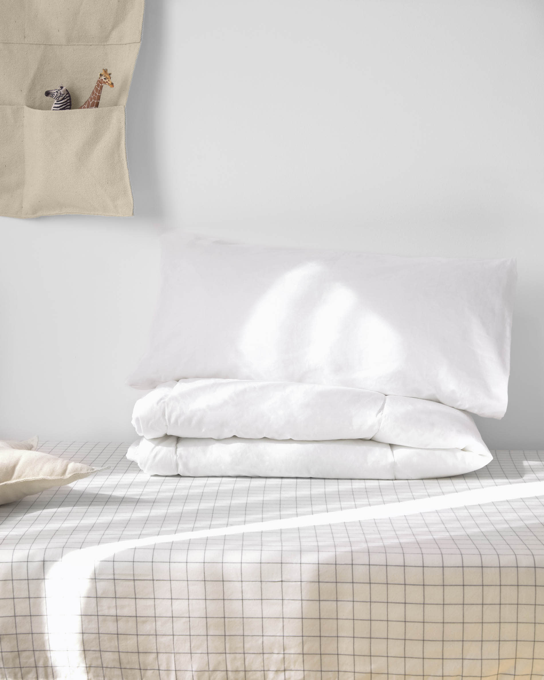 Gianela Bettdecke aus 100% Baumwolle, 70x140 cm, von Kave Home. Weich, atmungsaktiv und ideal für erholsamen Schlaf.