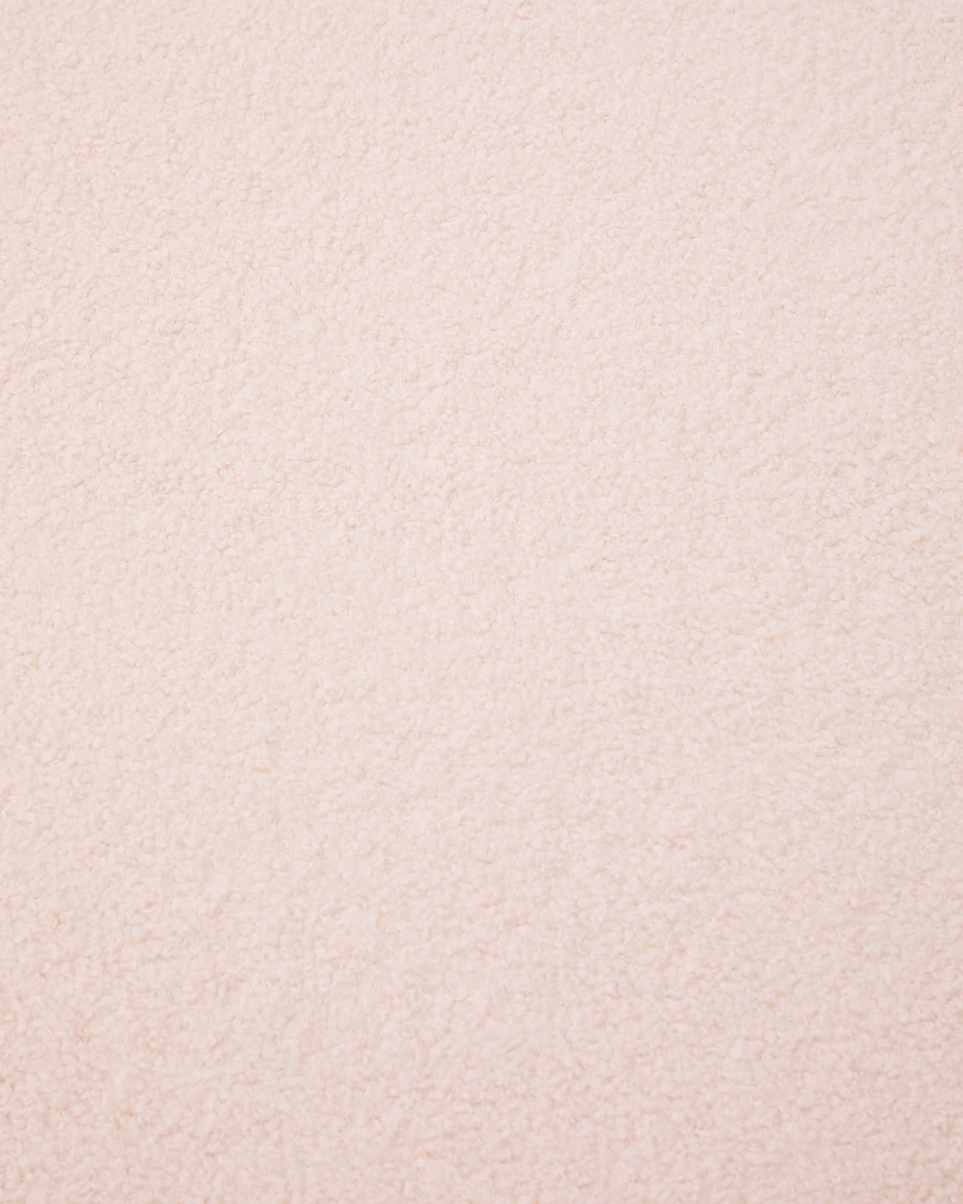 Stylischer Bezug für Fusshocker Kaeli in zartem Rosa, Ø 43 cm. Hergestellt aus hochwertigem Bouclé-Stoff, umweltfreundlich und langlebig.