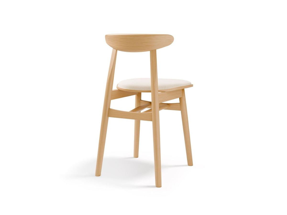Zwei Stühle des Modells Bony aus Massivholz Buche mit gepolstertem Sitz und Rückenlehne in mint-farbenem Stoff, Beine aus Buchenholz.