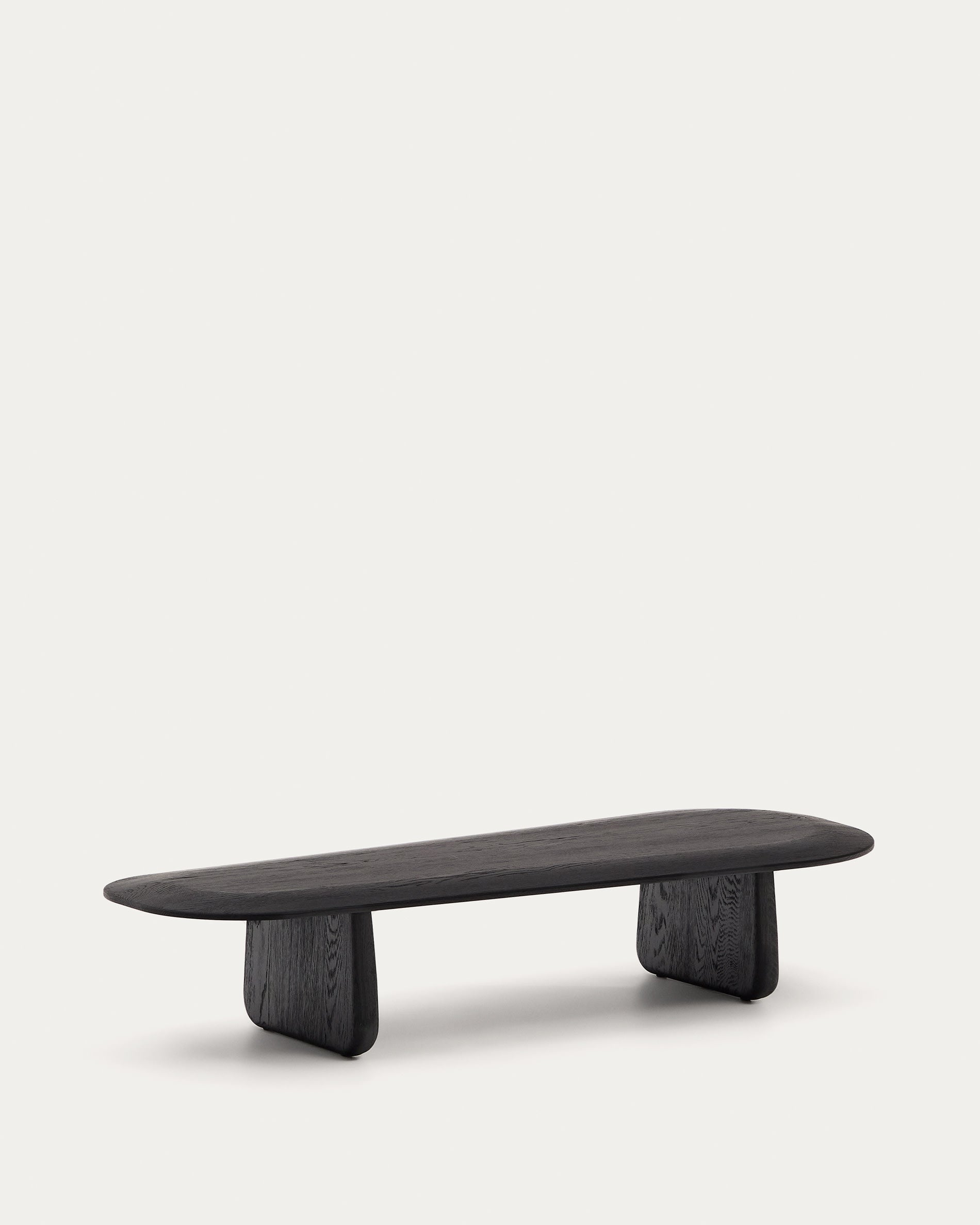 Eleganter Couchtisch aus massiver Eiche mit schwarzem Finish, FSC-zertifiziert, 146 x 56,5 cm, ideal für stilvolle Wohnräume.