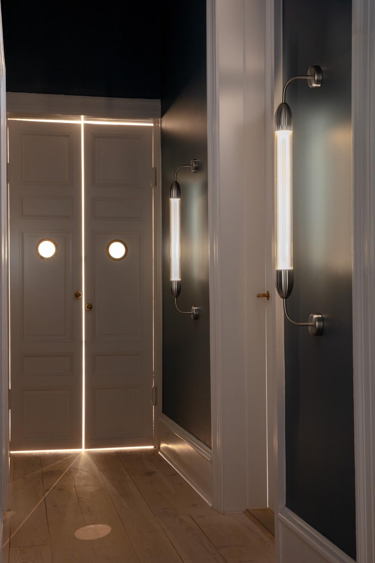 Elegante Wandleuchte "Lemon Squeeze" von Umage, gefertigt aus hochwertigem poliertem Stahl, perfekt für ein modernes Ambiente.