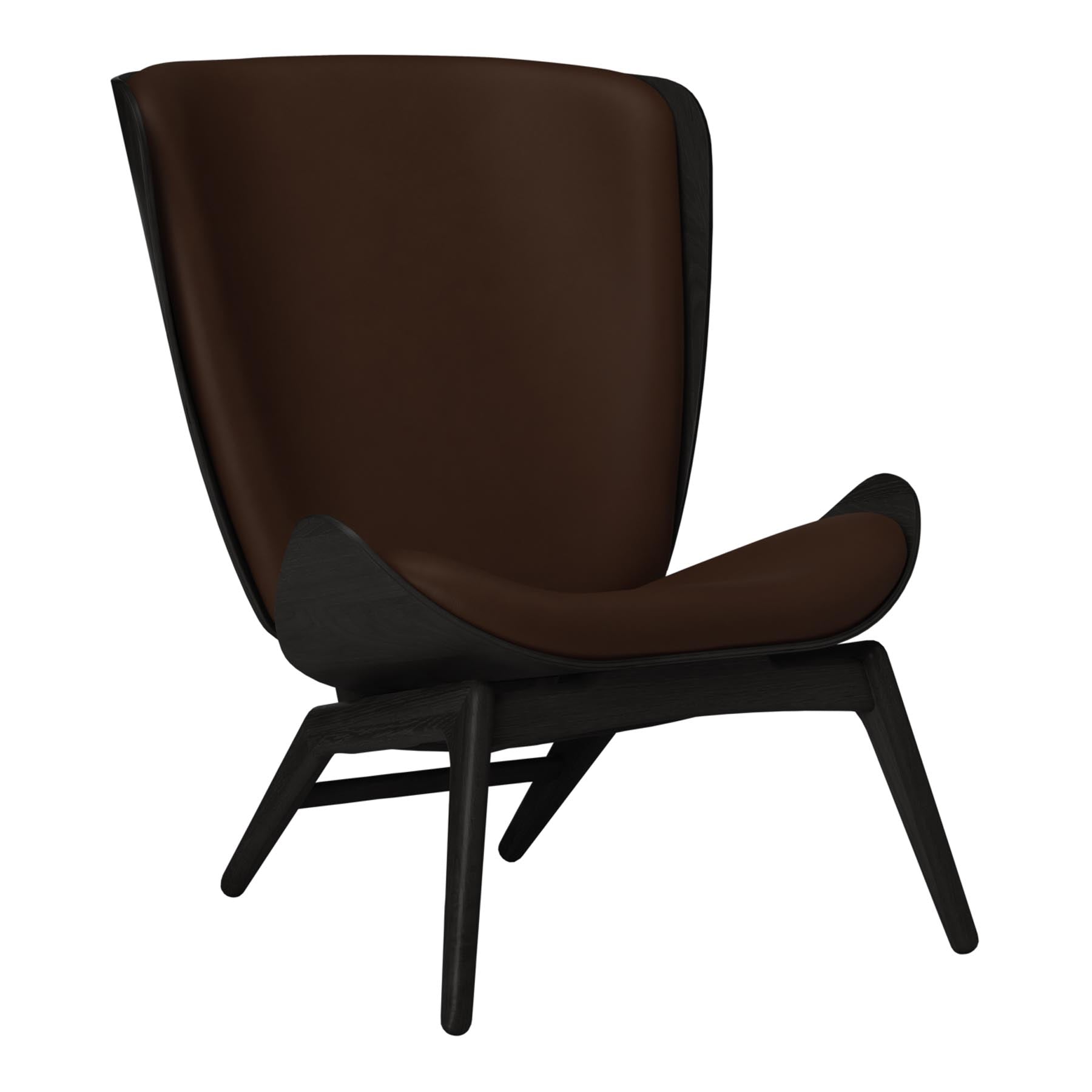 Moderner Reader Sessel von Umage, perfekt für entspannte Stunden. Sein stilvolles Design und die bequeme Polsterung laden zum Verweilen ein.