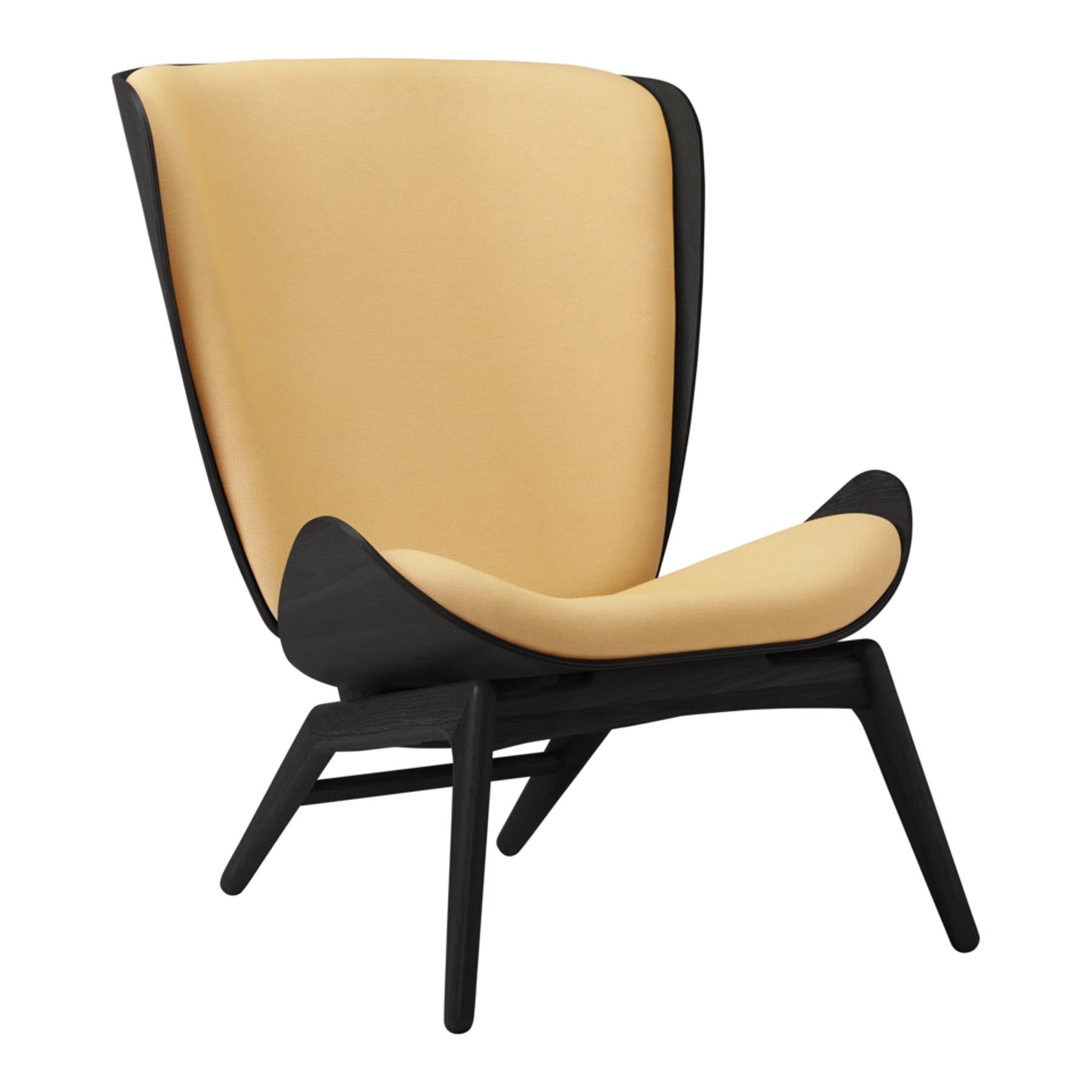 Eleganter Reader Sessel von Umage, ideal für gemütliche Leseecken und geschmackvolle Wohnräume.