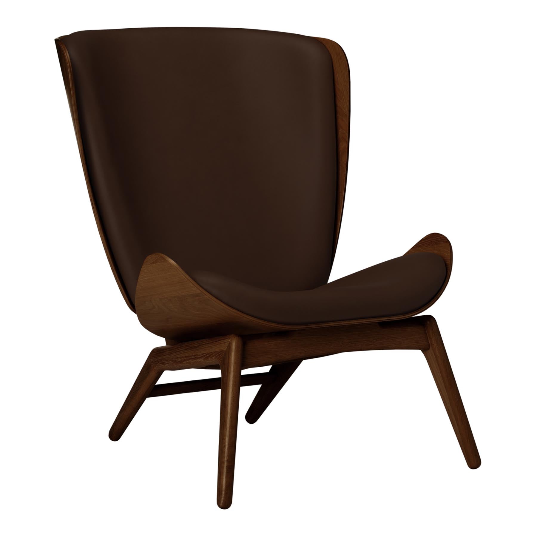 Eleganter Reader Sessel von Umage, ideal für gemütliche Leseecken und stilvolle Wohnräume, vereint Komfort und modernes Design.