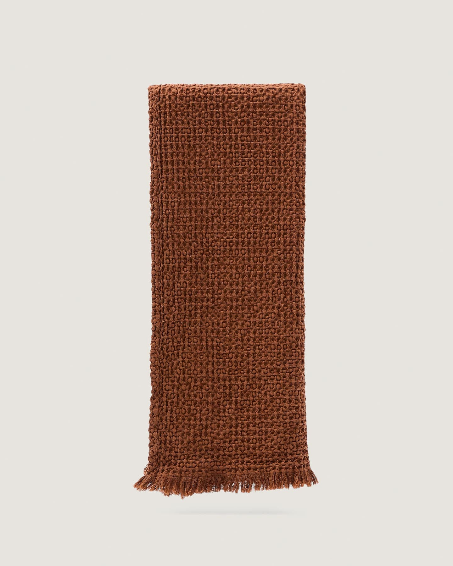 Decke Nulina aus 100% Baumwoll-Waffelpiqué in Dunkelorange 130 x 170 cm in Dunkelorange präsentiert im Onlineshop von KAQTU Design AG. Wolldecke ist von Kave Home