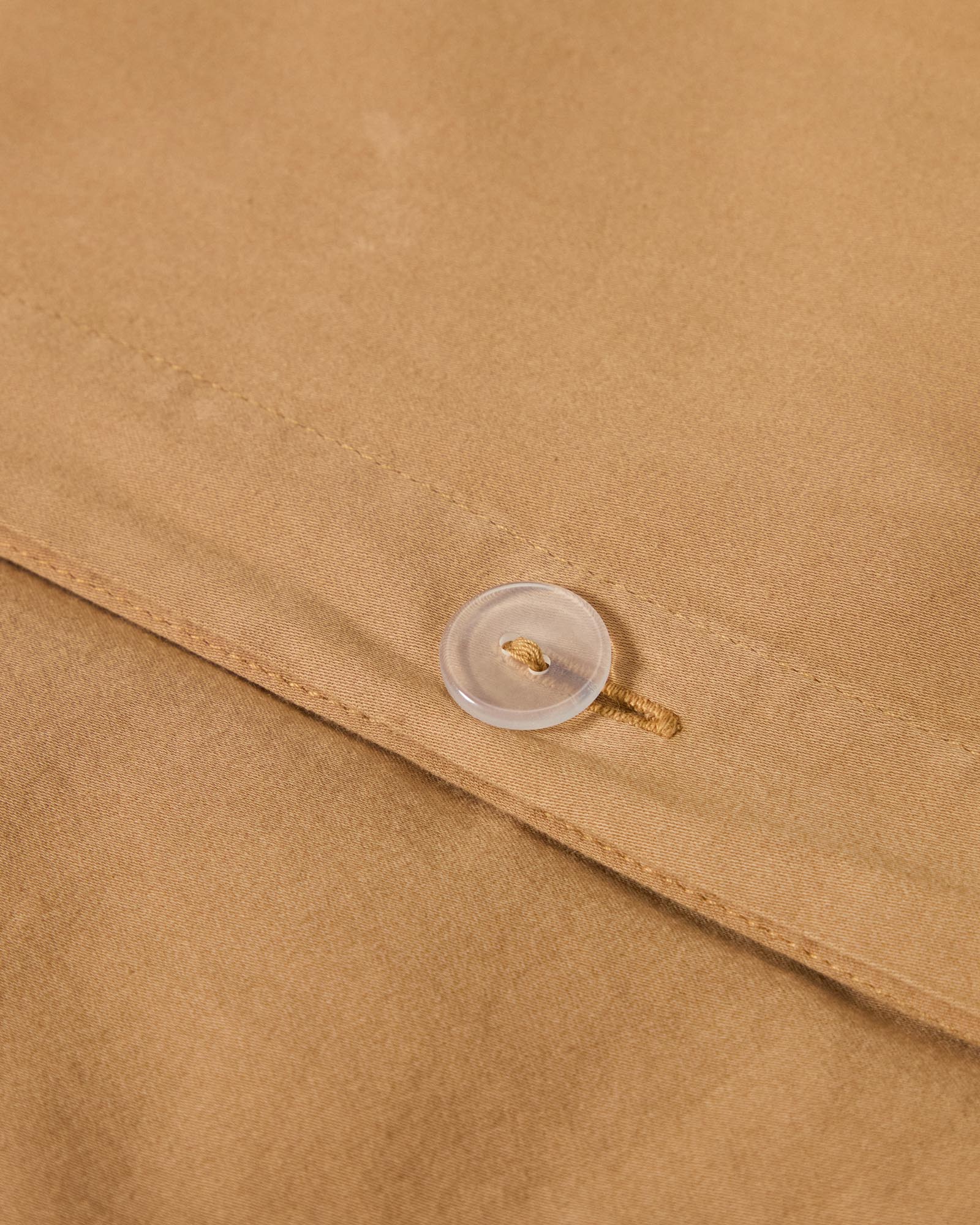 Luxuriöser Bettbezug Sirale in stilvollem Kupfer, aus 100 % Baumwollsatin mit weichem Washed-Finish, perfekt für Betten von 150/160 cm.