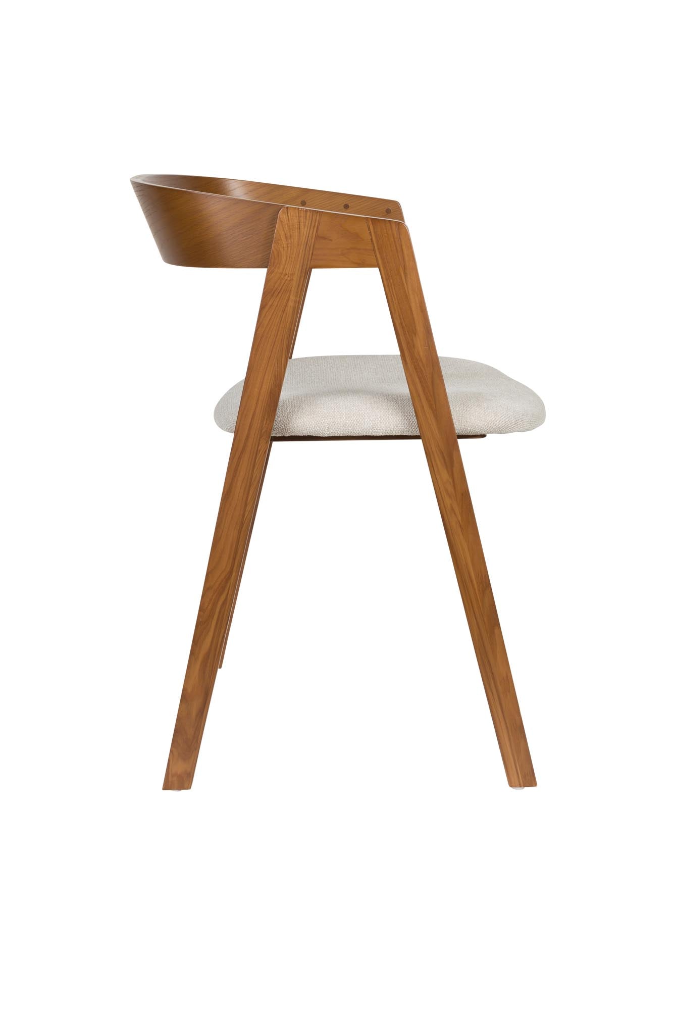 Erleben Sie den Stuhl Mads von Zuiver – ein elegantes Möbelstück aus hochwertigem Eschenholz, das Komfort und Stil in jeden Essbereich bringt.