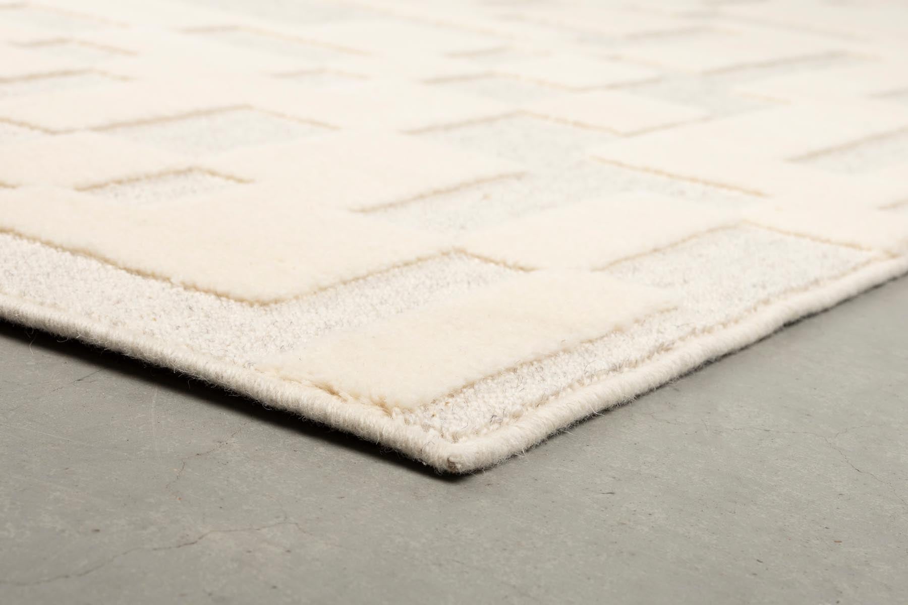 Teppich Bricks 200x300 in Grau präsentiert im Onlineshop von KAQTU Design AG. Teppich ist von Zuiver