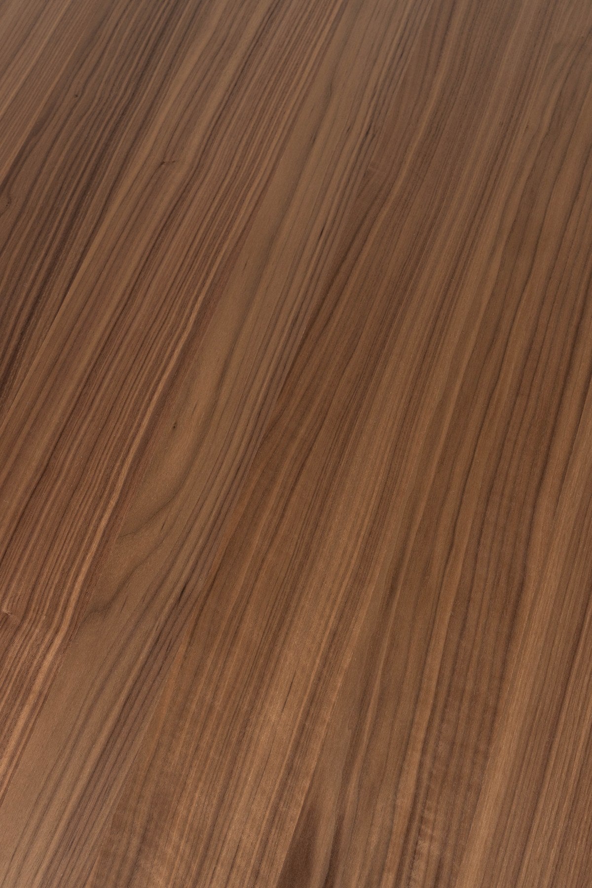 Runder Esstisch Dining Table Lotus Walnut von Zuiver in Braun mit achteckigem, sanduhrförmigem Holzgestell und beschichteter Tischplatte.