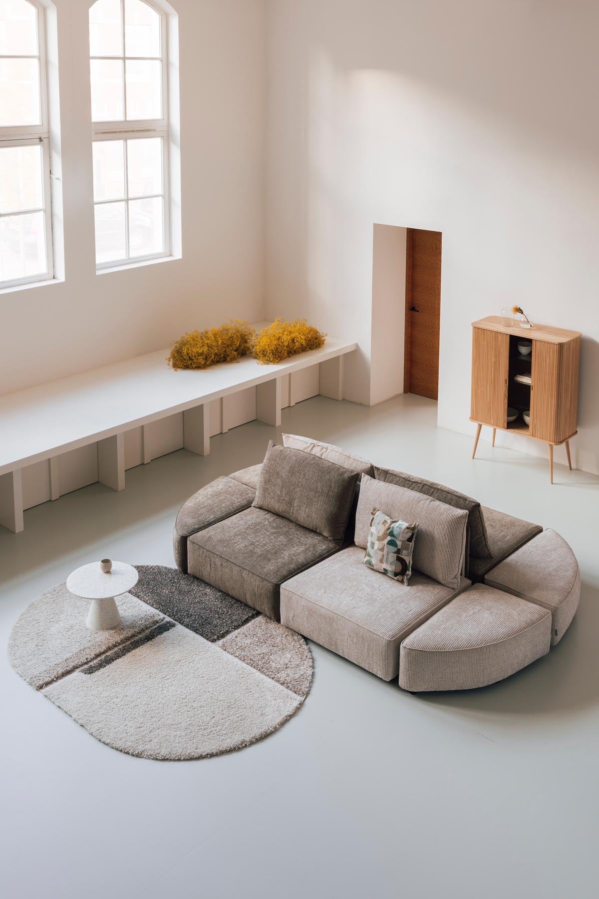 Sofa Element Hunter Pie Pouf links in Sand präsentiert im Onlineshop von KAQTU Design AG. Modulares Sofa ist von Zuiver