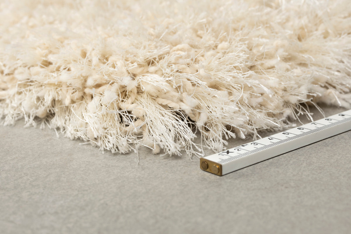Curly Teppich 160x230 in beige präsentiert im Onlineshop von KAQTU Design AG. Teppich ist von Zuiver