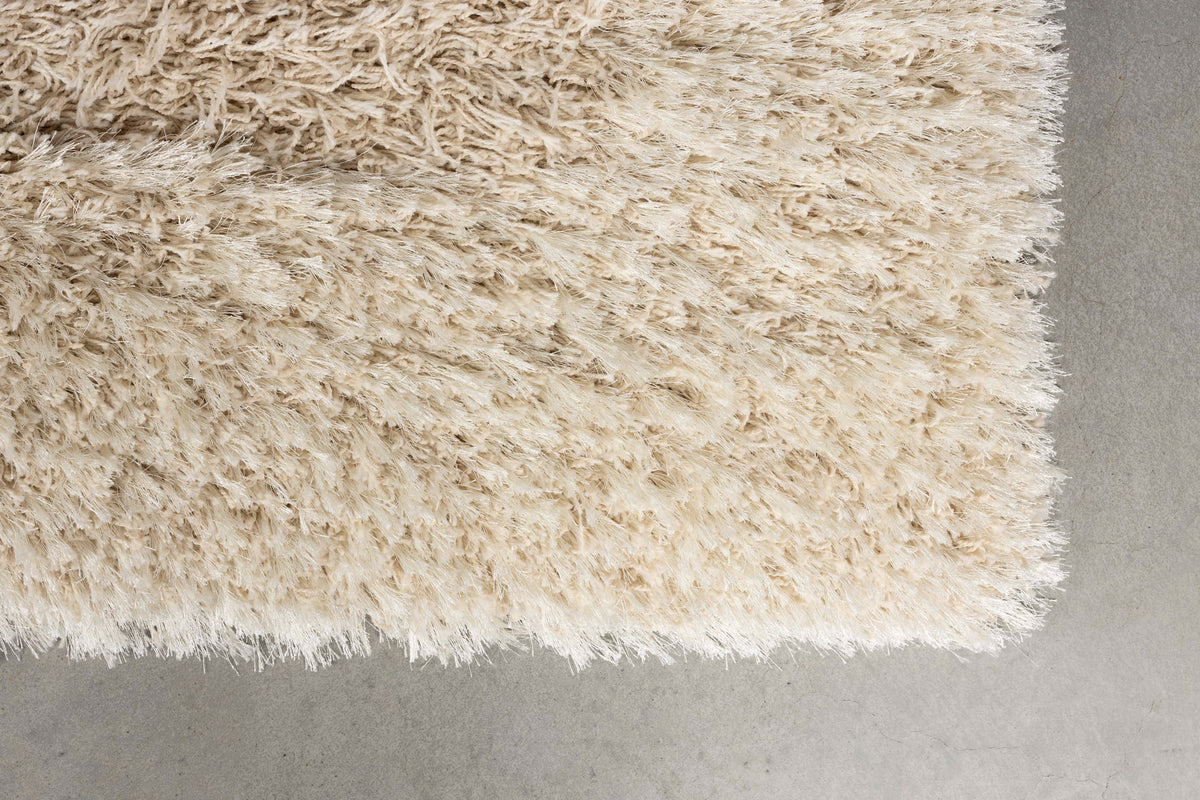 Curly Teppich 160x230 in beige präsentiert im Onlineshop von KAQTU Design AG. Teppich ist von Zuiver
