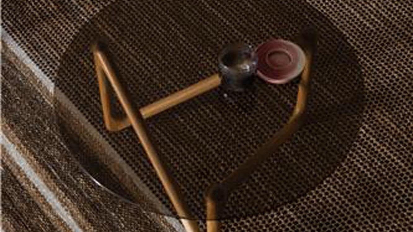 Eleganter Dutchbone Couchtisch mit modernem Design, Holzoberfläche und stilvollen Metallbeinen, ideal für jedes Wohnzimmer.