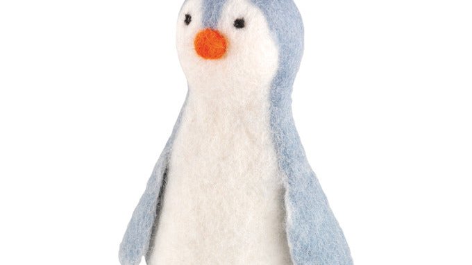 CILIO Lana Untersetzer und Eierwärmer in Tierform aus Schafwolle auf einem gedeckten Frühstückstisch