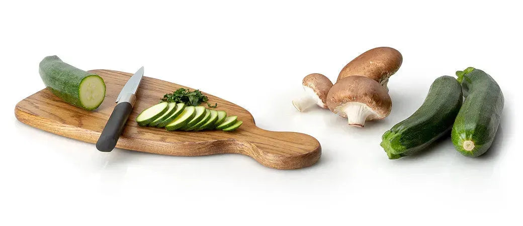 Natürliche Eleganz für Ihr Zuhause: Hochwertige Produkte der Continenta Kollektion aus Holz und Stein, stilvoll arrangiert in einem modernen Wohnambiente.