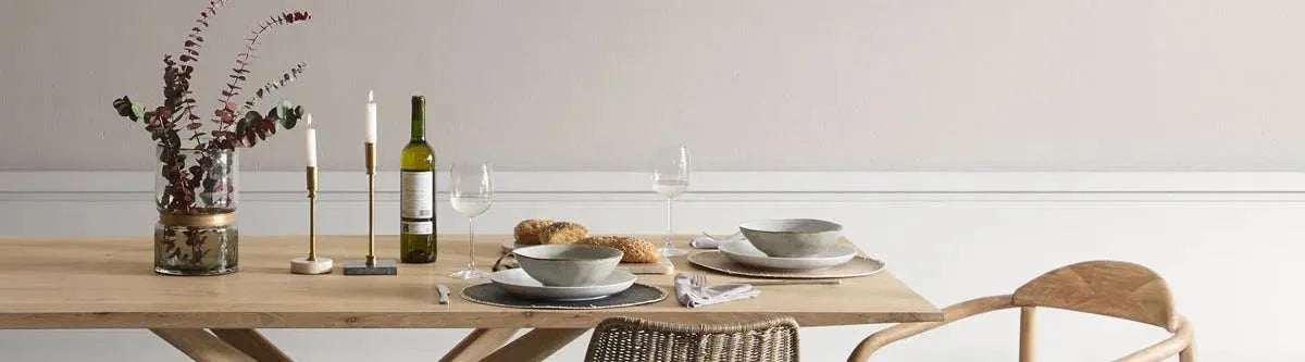 VACUVIN Kollektion bei KAQTU: Innovative Wein- und Küchenaccessoires, darunter Vakuum-Weinverschlüsse, Weinkühler, Schneidebretter und Salatschleudern, präsentiert in einem stilvollen und funktionalen Design.