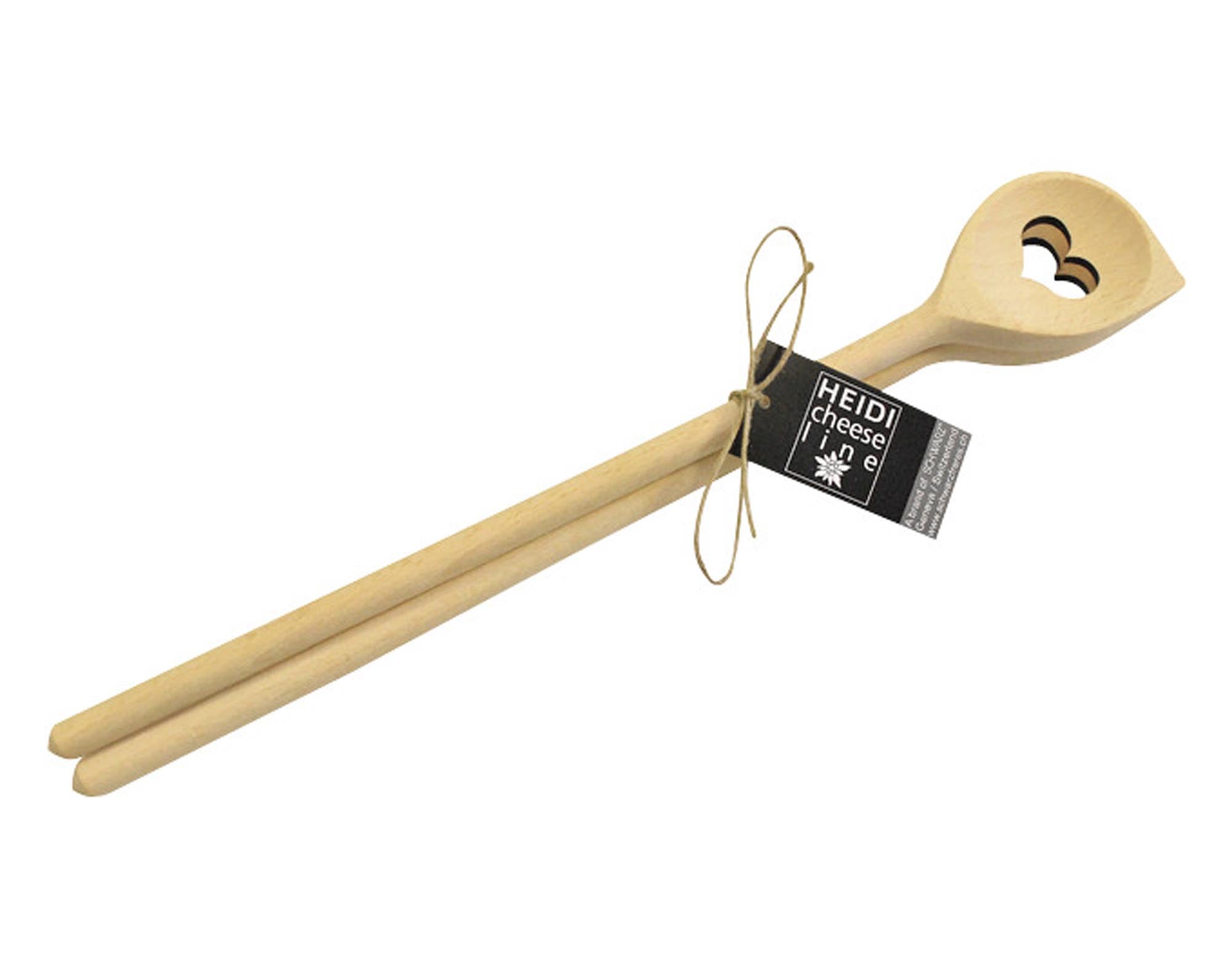 Handgefertigte Lochkelle aus Holz mit herzförmigem Lochdesign, ideal zum Rühren und Servieren. Nachhaltig und stilvoll von HEIDI.