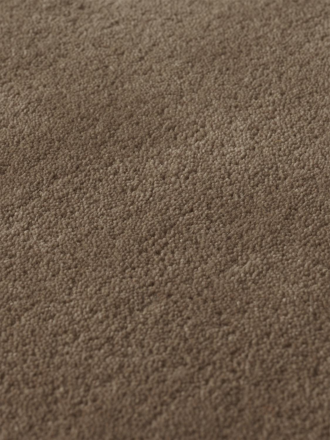 Luxuriöser Tufted Teppich 140x200 aus weicher Neuseeland-Wolle.