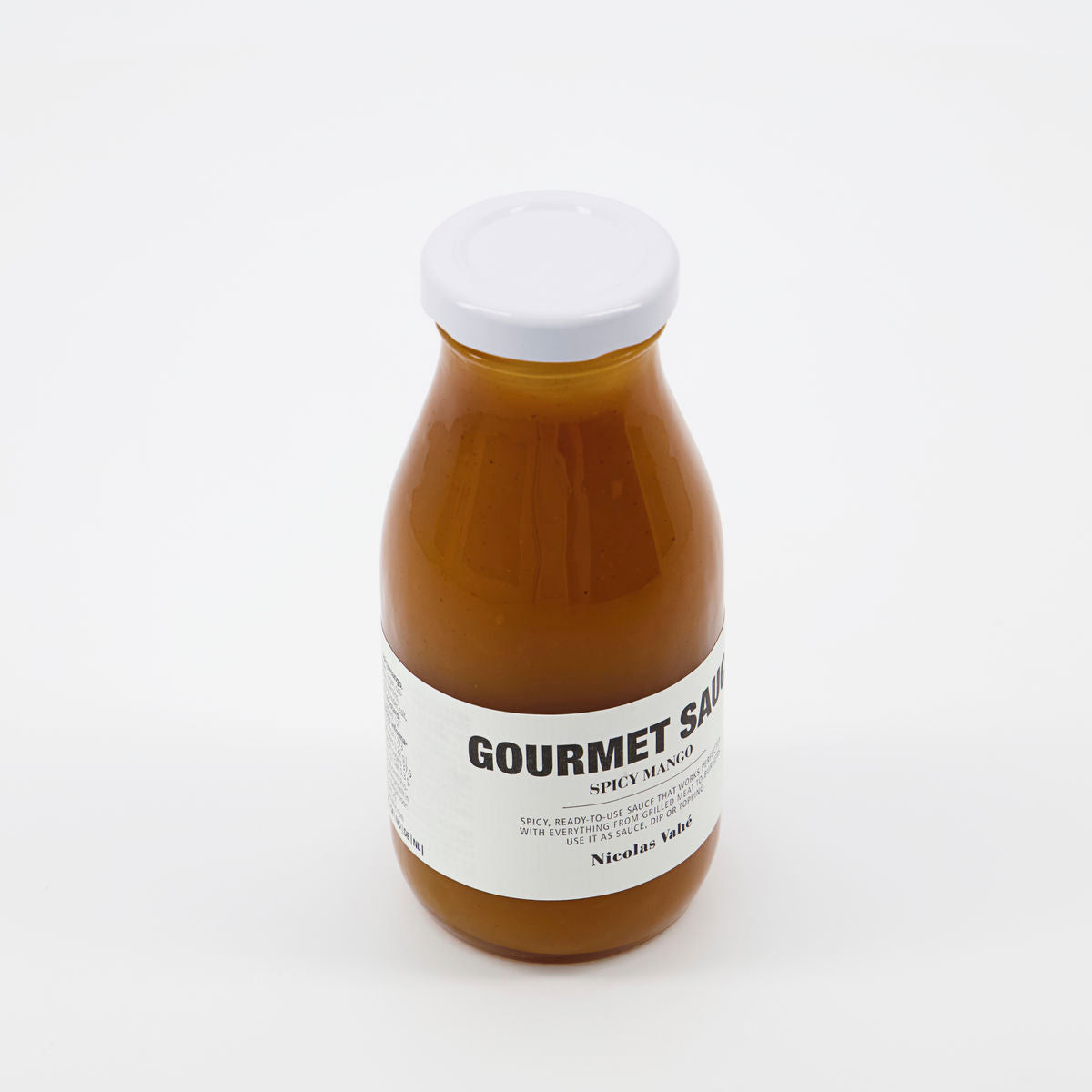 Würzige Mango-Sauce von Nicolas Vahé, ideal für exotische Gerichte.