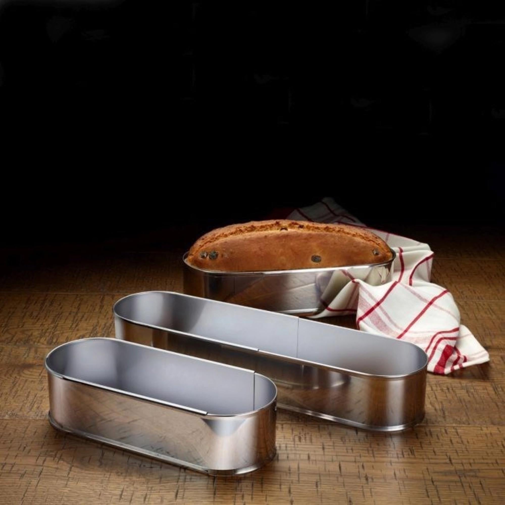 Praktische ovale Backform von Westmark, ausziehbar von 27-40 cm, ideal für Kuchen und Aufläufe, Maße: 27x9.5x7 cm.