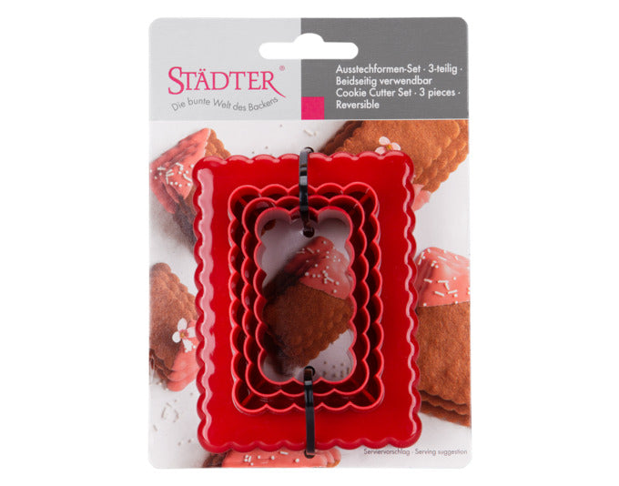 Praktisches STÄDTER Rechteck-Ausstecher-Set in Rot, ideal für kreative Backideen, 5 Größen von 5.5x3.0 cm bis 9.5x7.0 cm.