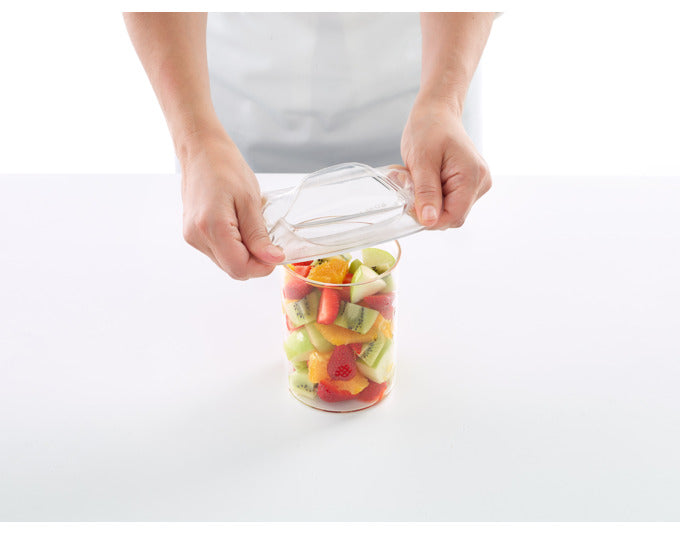 Transparente Silikon-Abdeckhauben von LÉKUÉ, 2 Stück, ø 11 cm, ideal zum Frischhalten von Lebensmitteln, wiederverwendbar und flexibel.