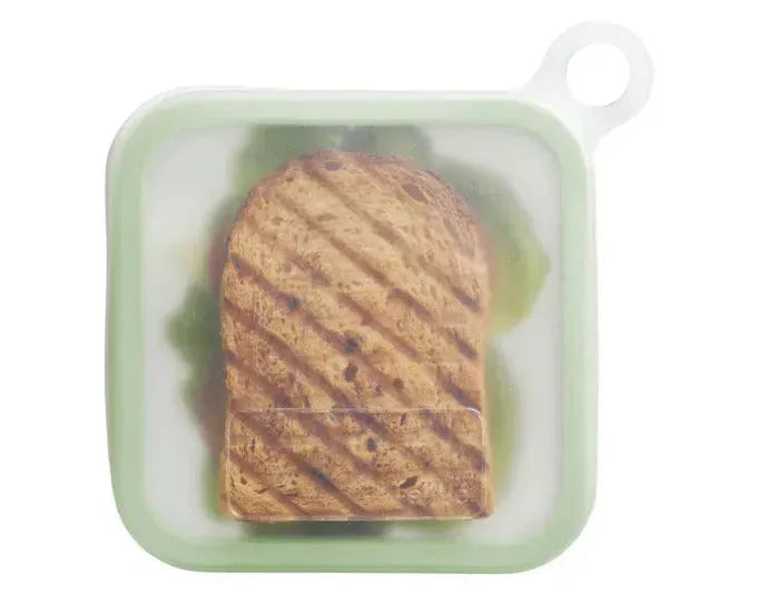 Wiederverwendbarer LÉKUÉ Sandwichbeutel aus Silikon, 18x18x2.5 cm, ideal für umweltfreundliches Verpacken von Snacks und Sandwiches.