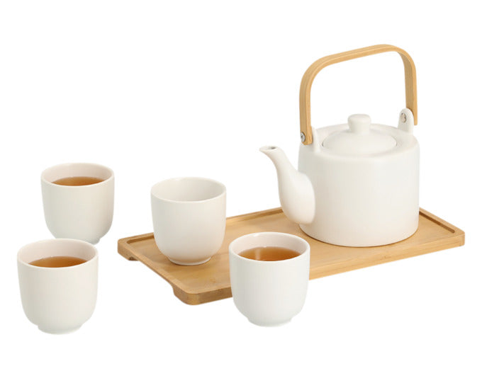 Elegantes 6-teiliges Teeset aus Steingut und Bambus in Weiß, ideal für stilvollen Teegenuss. Enthält Tasse, Untersetzer und Zubehör.