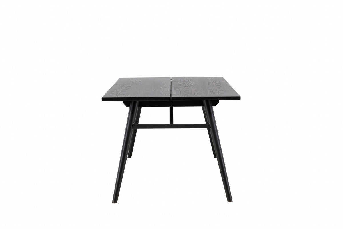 Sleek ausziehbarer Tisch in Schwarz präsentiert im Onlineshop von KAQTU Design AG. Esstisch ist von Venture Home