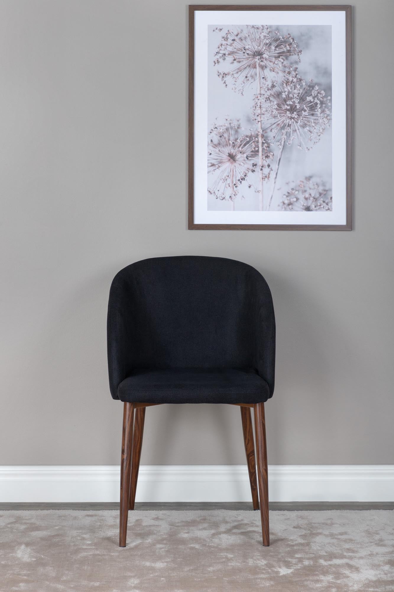 Bogenstuhl in Schwarz präsentiert im Onlineshop von KAQTU Design AG. Schalenstuhl mit Armlehne ist von Venture Home