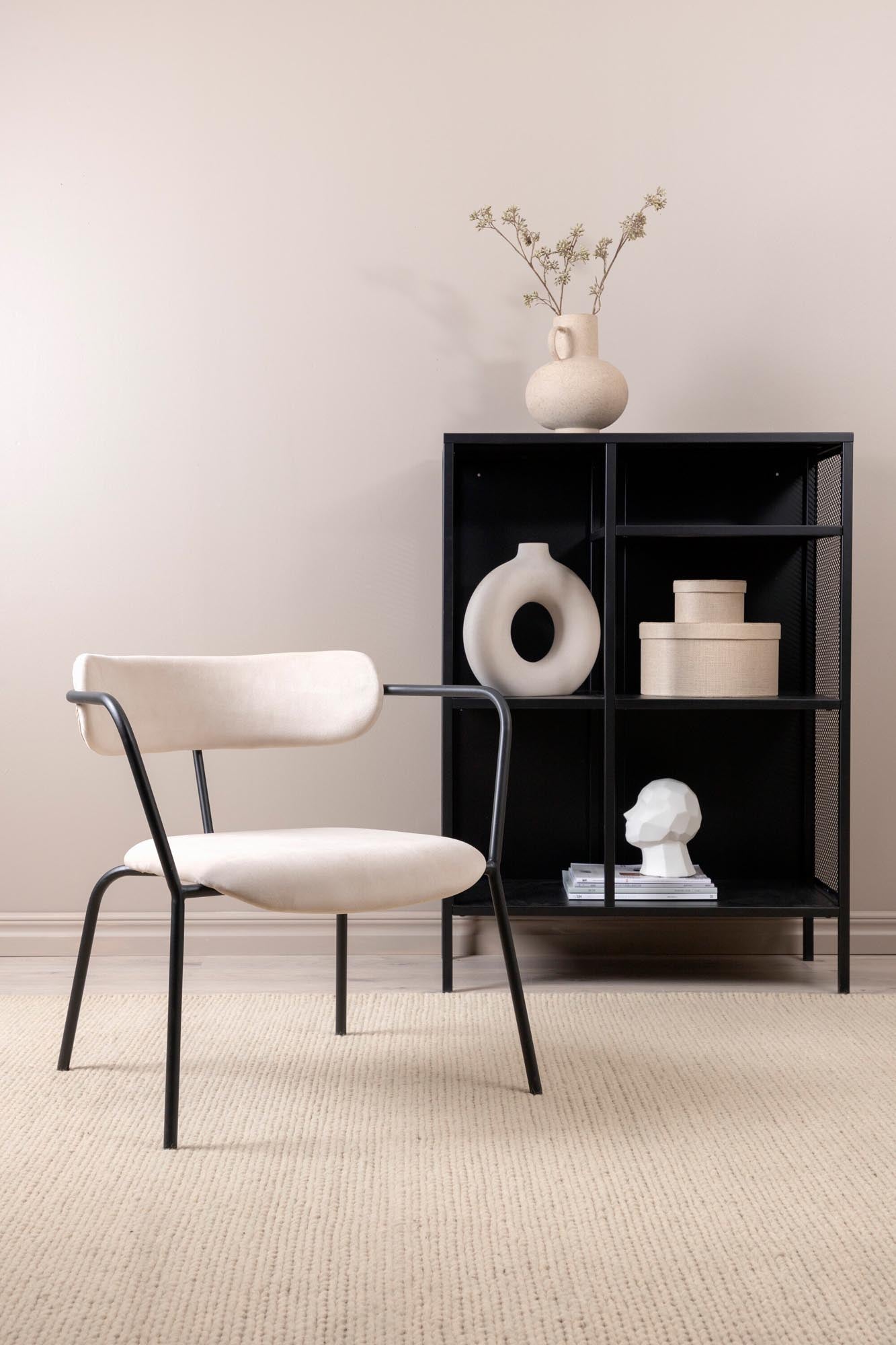 Duffy Sessel von Venture Home: Luxuriöser Samt, ergonomische Form und robuste Bauweise für höchsten Komfort und zeitlose Eleganz.