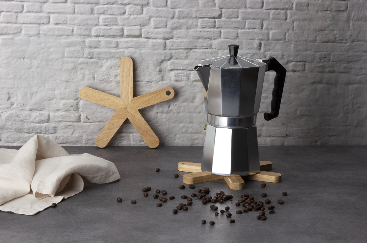 Gummibaum Untersetzer Stern in Braun präsentiert im Onlineshop von KAQTU Design AG. Kochbesteck ist von Continenta