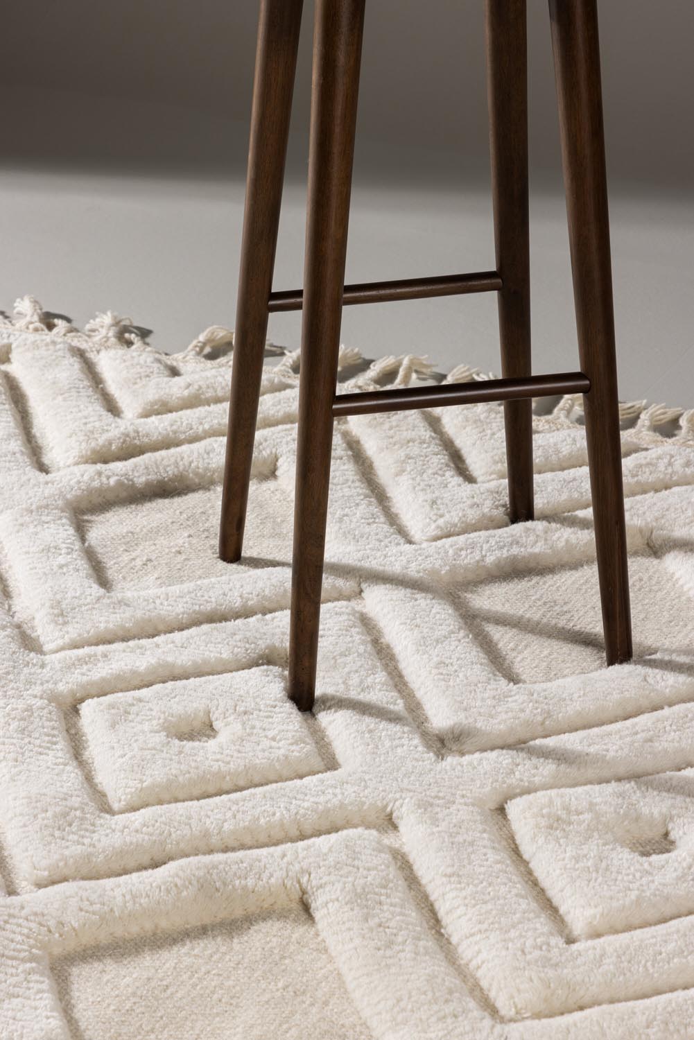 Dahlia Wool Teppich in Weiss präsentiert im Onlineshop von KAQTU Design AG. Teppich ist von Vind