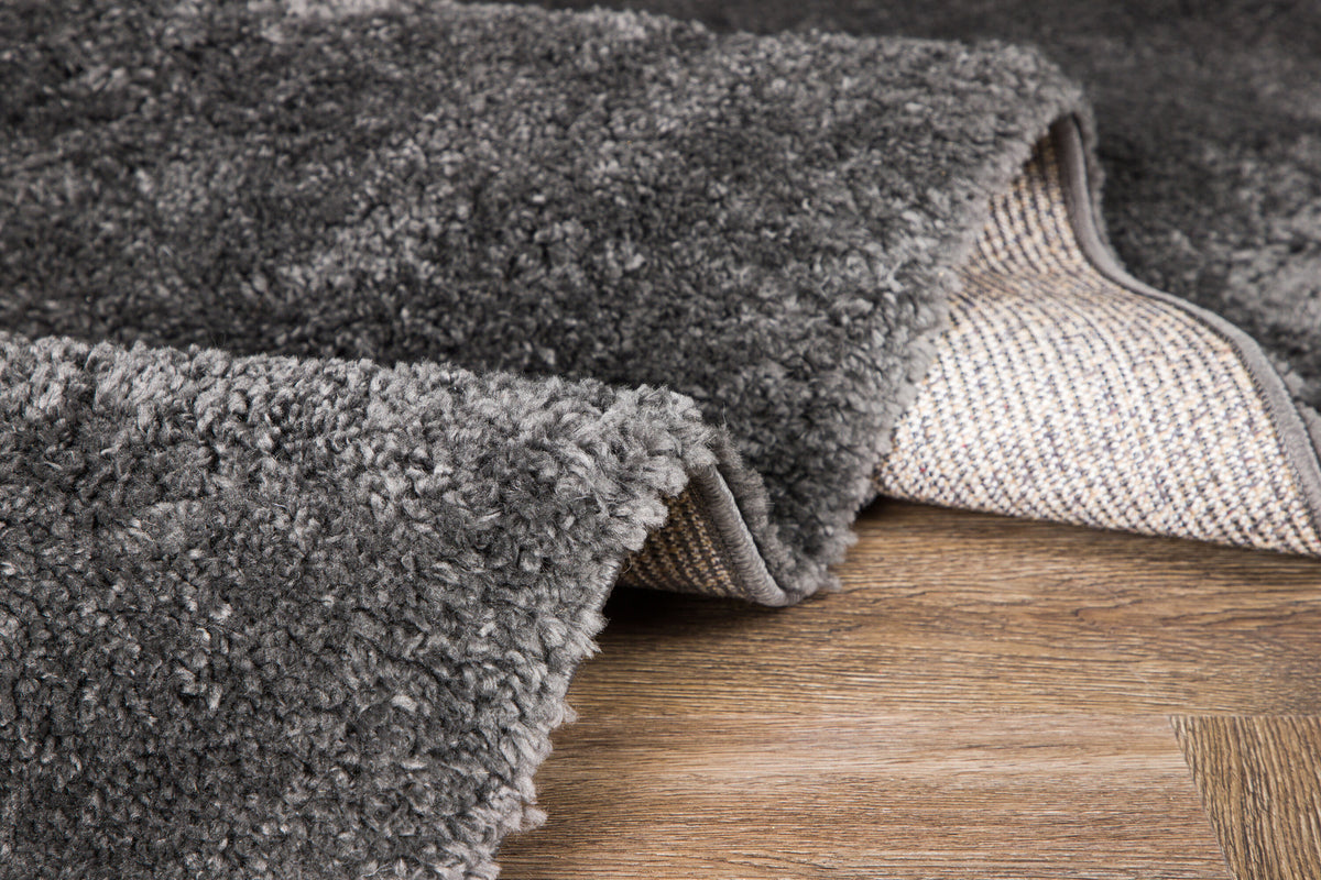 Walter Pluto Teppich Rechteckig in Dunkelgrau präsentiert im Onlineshop von KAQTU Design AG. Teppich ist von Venture Home