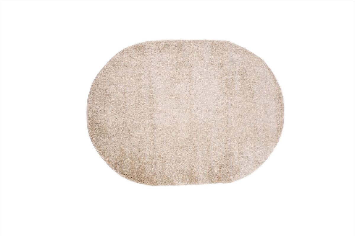 Walter Pluto Teppich Oval in Beige präsentiert im Onlineshop von KAQTU Design AG. Teppich ist von Venture Home