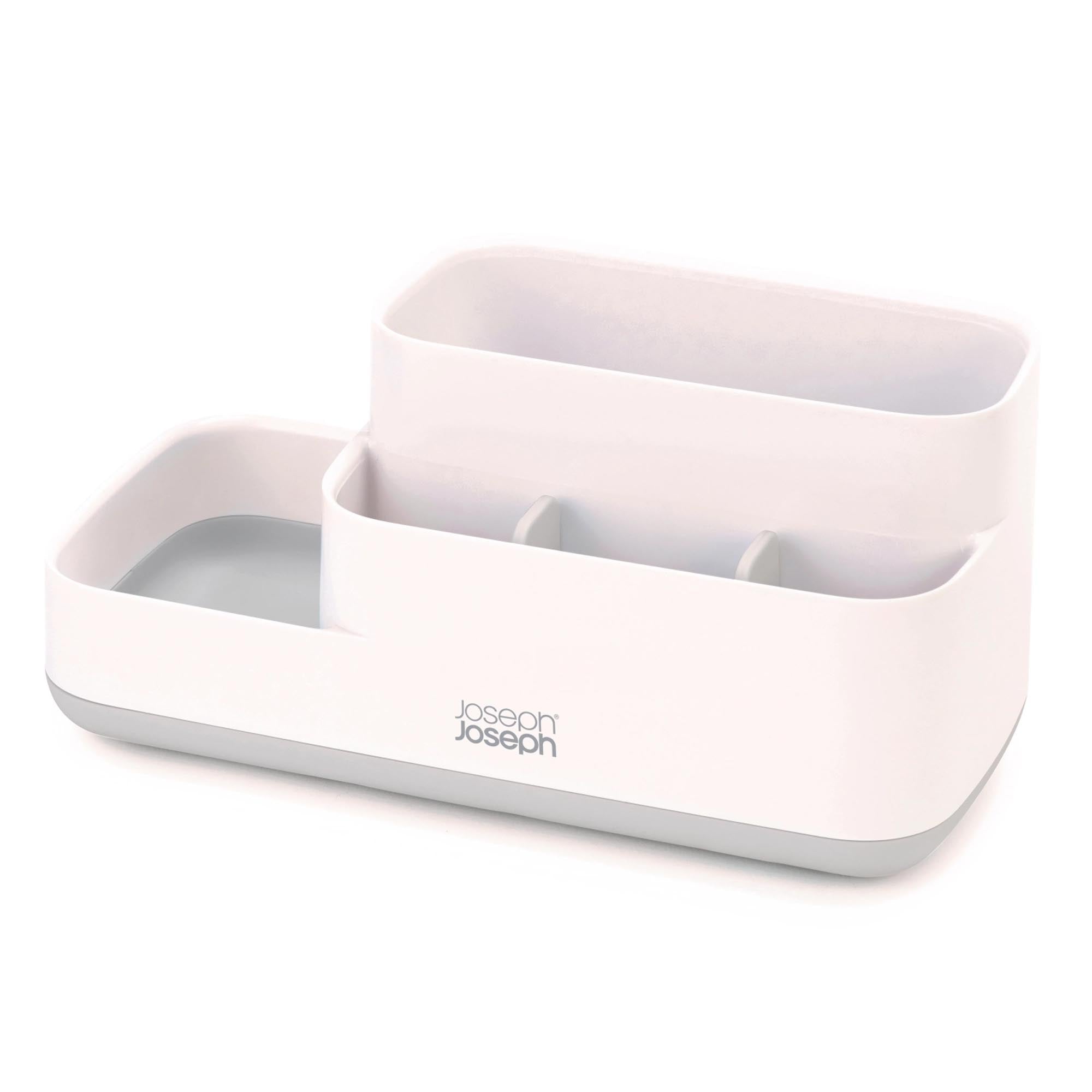 Kompakter, stilvoller Caddy in Weiß-Grau von Joseph Joseph, ideal für kleine Bäder. Robustes ABS, perfekt für Seifen & Shampoos.