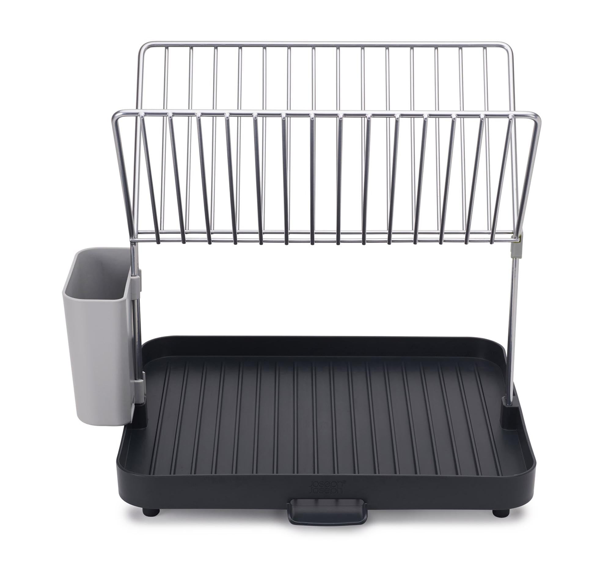 Kompakter Y-Rack Geschirrabtropfständer in Grau von Joseph Joseph, mit Gitter für effizientes Trocknen und platzsparende Aufbewahrung.