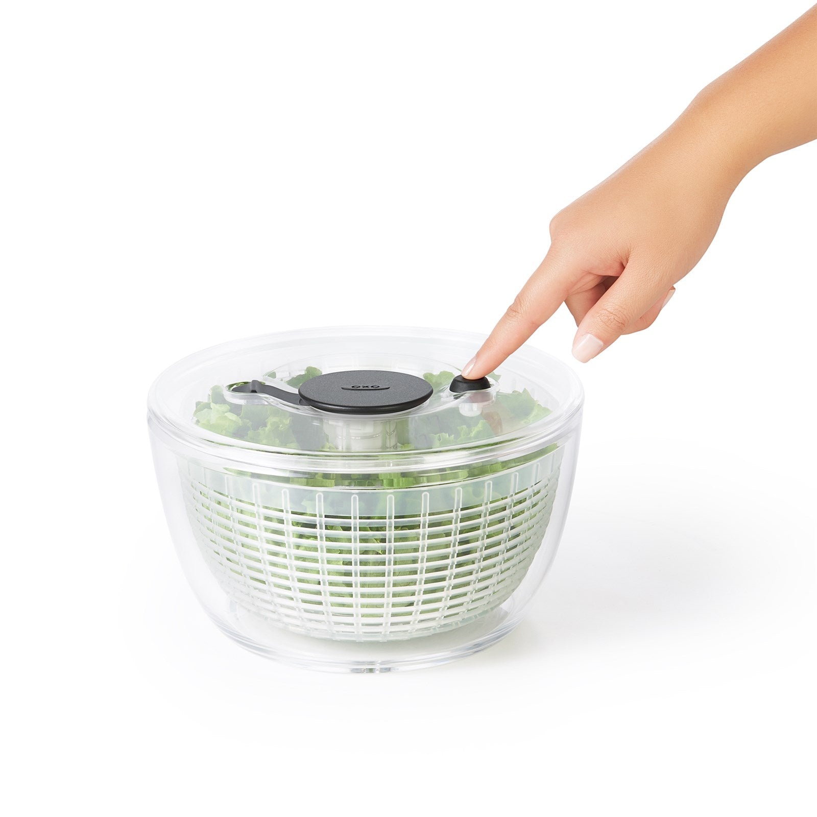 Kompakte OXO Salatschleuder, 2.7L, transparent, BPA-frei, spülmaschinenfest, rutschfest, ideal für frische Salate.