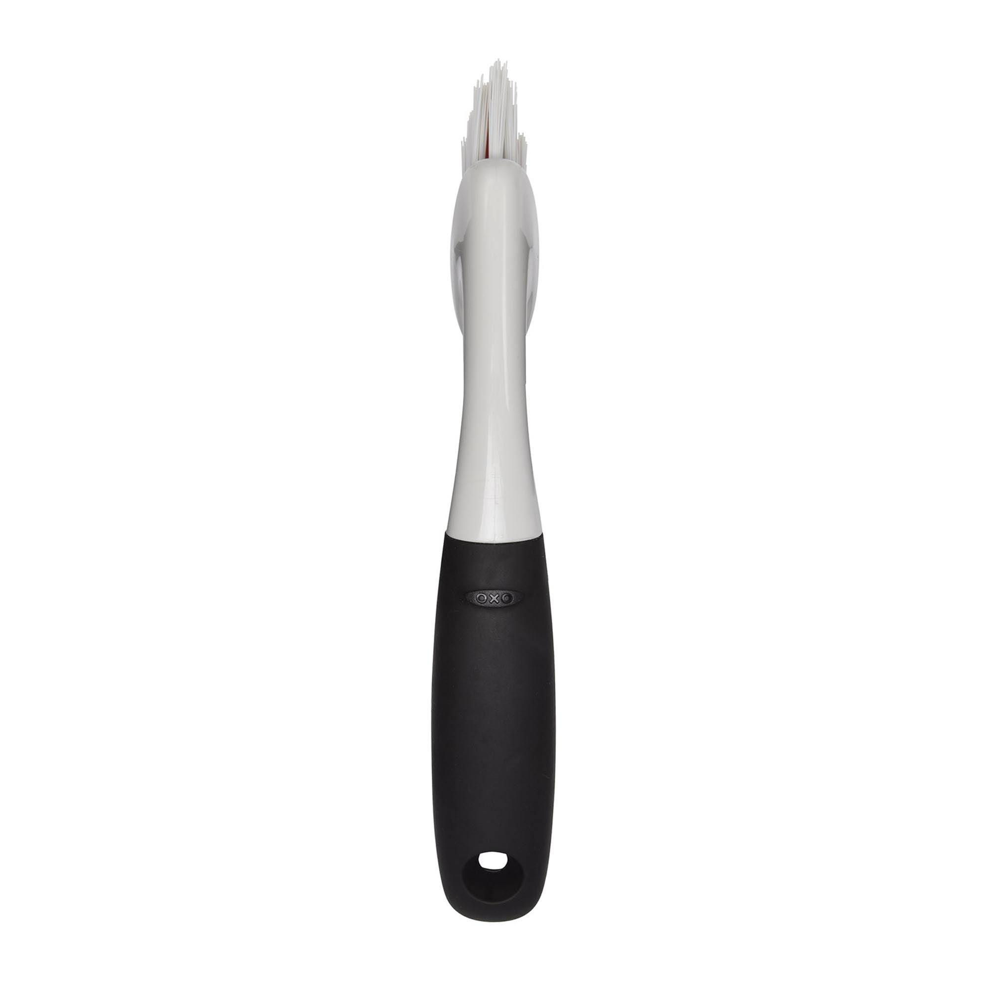 Entdecken Sie die OXO Reinigungsbürste für Rillen und Kanten: Ergonomisch, langlebig und perfekt für präzise Reinigung in Küche und Bad.