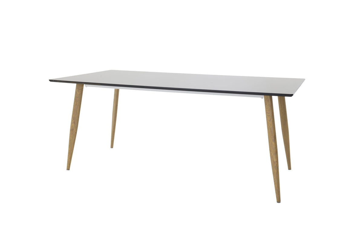 Rechteckiger Esstisch Polar von Venture Home mit schwarzer MDF-Tischplatte und naturfarbenen, leicht ausgestellten Metallbeinen im skandinavischen Design.