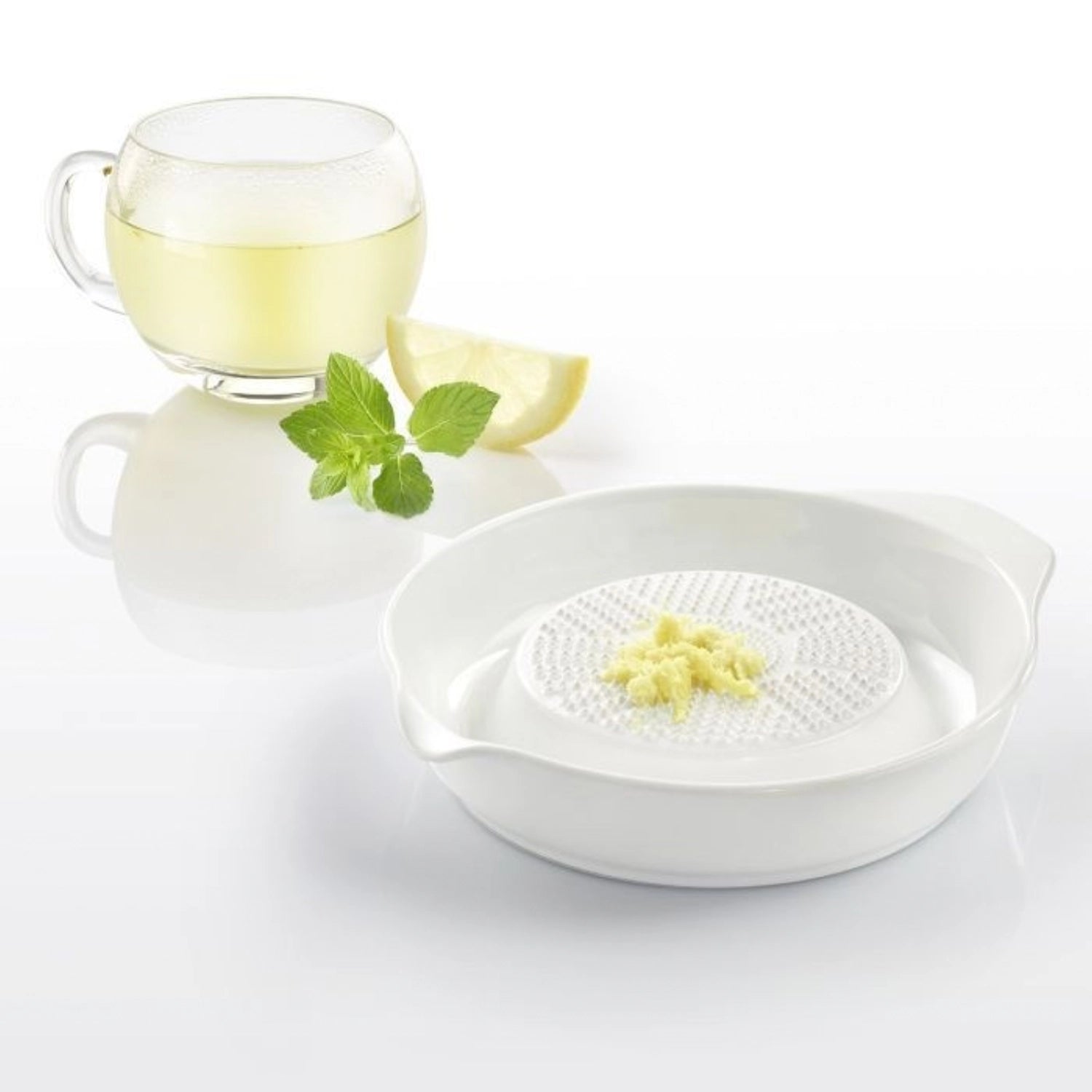 Stilvolle runde Keramikreibe von Westmark, 180ml, ideal zum einfachen Zerkleinern von Käse, Gemüse und Gewürzen für kreative Kochideen.