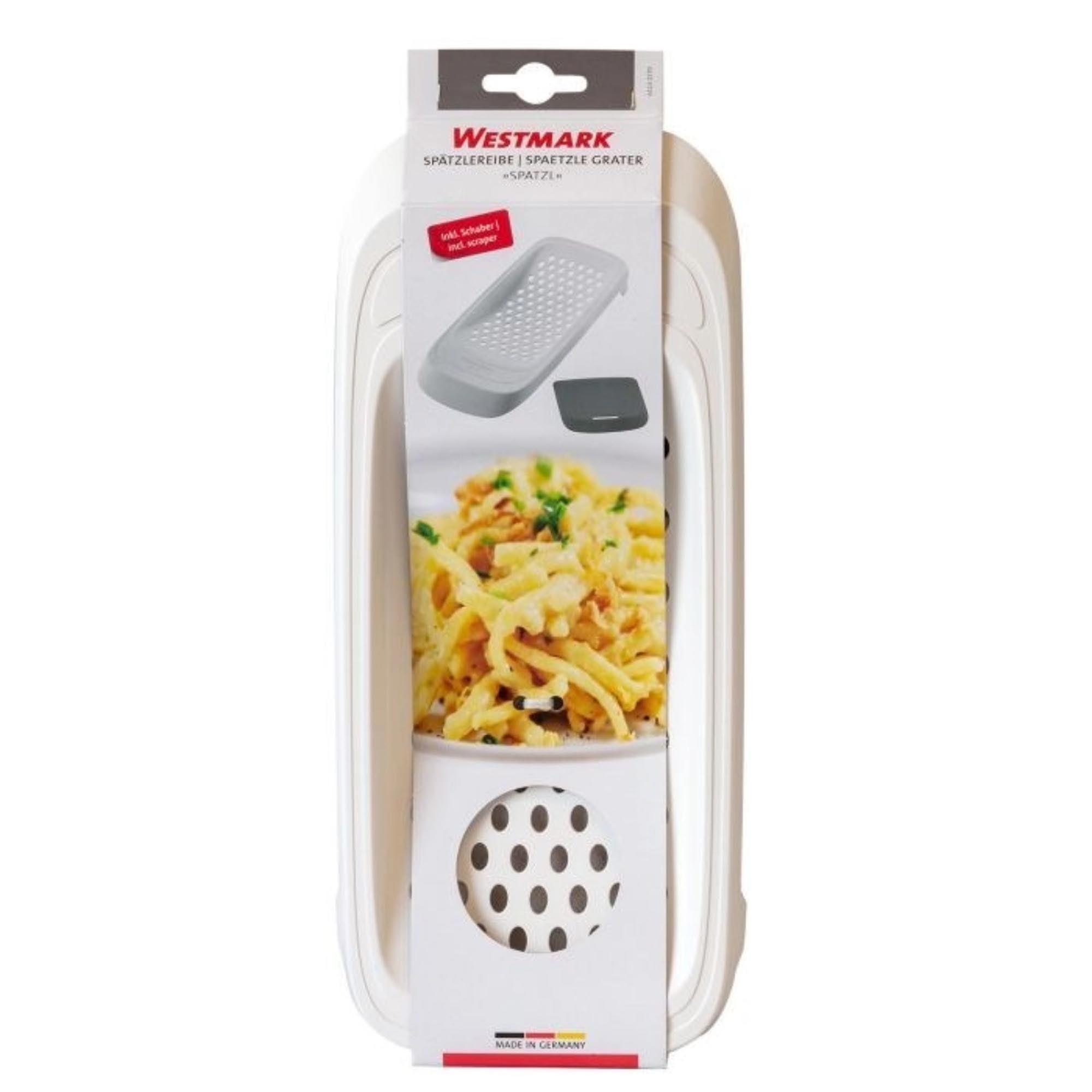 Spätzlereibe von Westmark mit flexiblem Schaber, ideal für hausgemachte Spätzle. Robuste Qualität, einfach zu handhaben und zu reinigen.