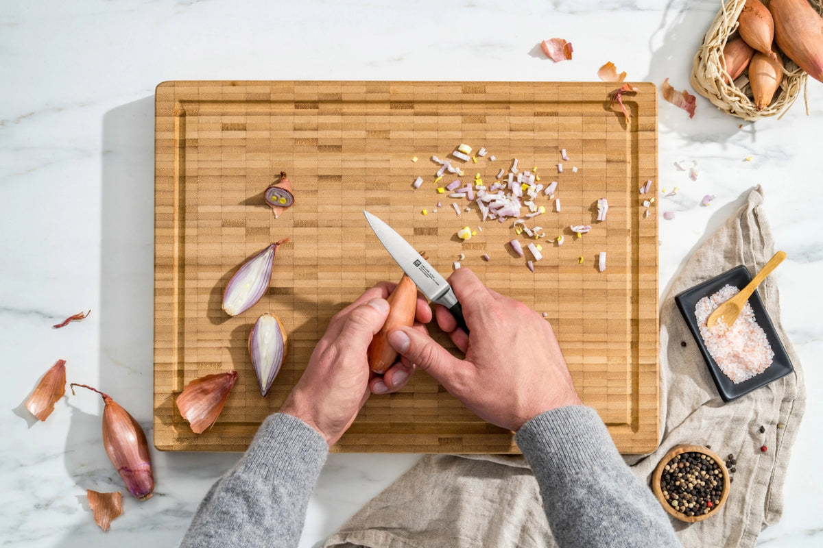 All Star Gemüsemesser 100 chrome-silber in Schwarz präsentiert im Onlineshop von KAQTU Design AG. Küchenmesser ist von Zwilling Kitchen