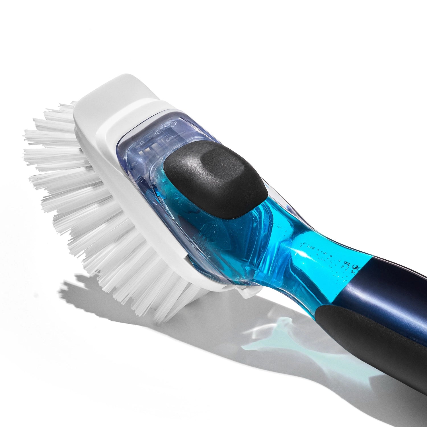 Effiziente OXO Good Grips Bürste mit integriertem Seifenspender, 23.6 cm, perfekt für müheloses Reinigen von Geschirr und Oberflächen in der Küche.