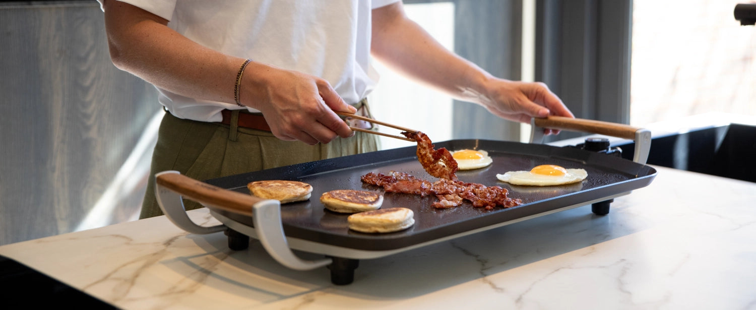 Pro Elektrische Grillplatte 68x35x10.3cm in Schwarz präsentiert im Onlineshop von KAQTU Design AG. Küchengerät ist von Boska