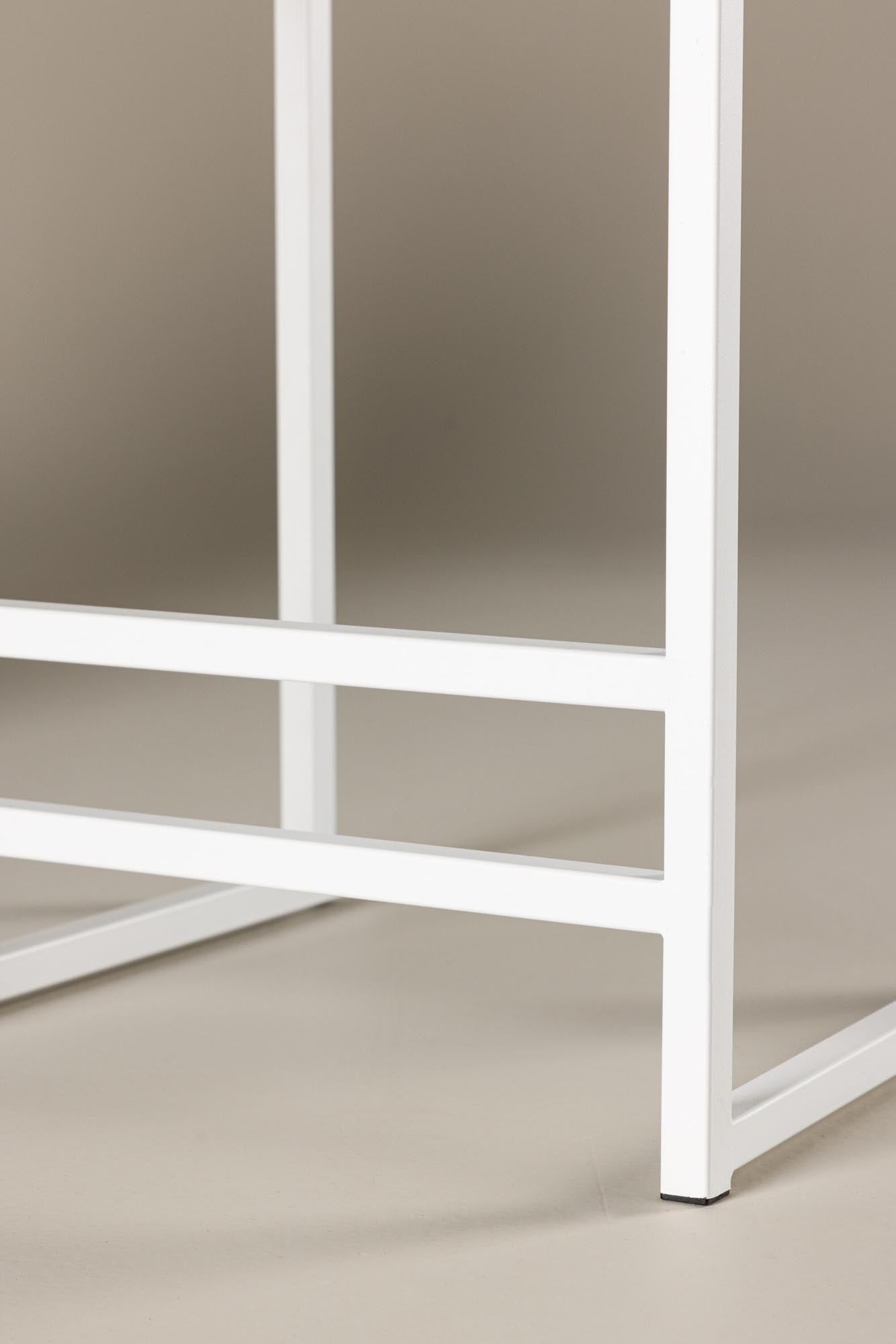 Eleganter Barhocker mit beigem Samtbezug und weißen Stahlbeinen, ideal für stilvolle Wohnräume.
