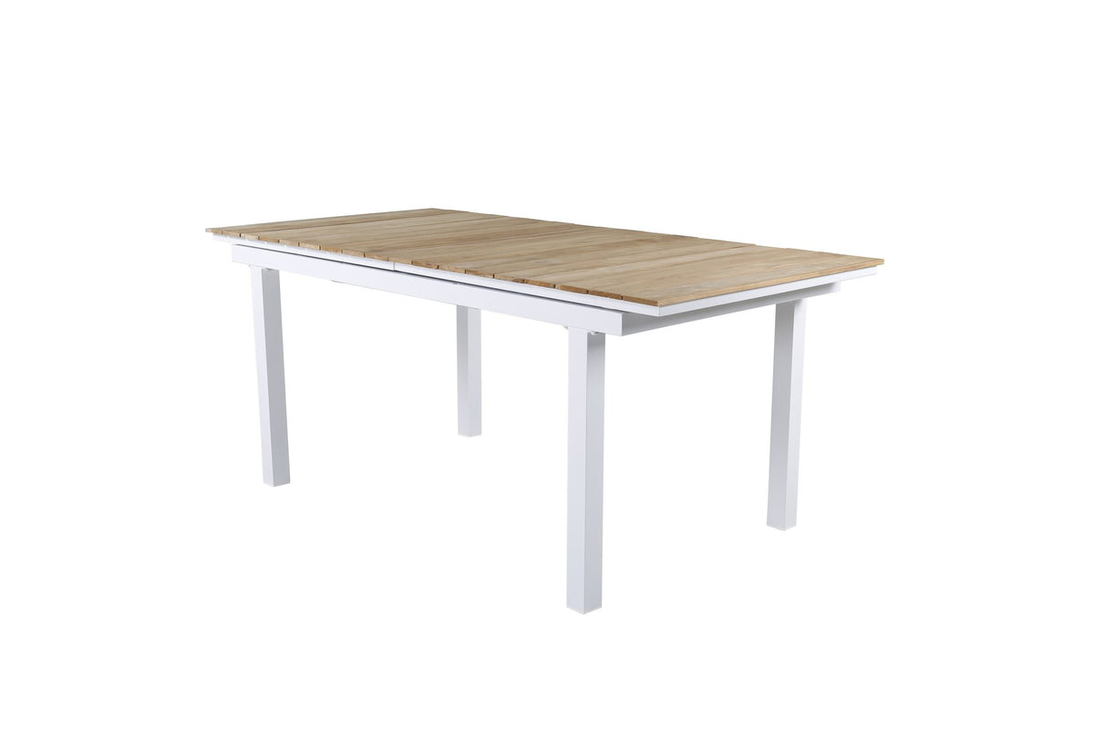 Rechteckiger Gartentisch Mexiko mit naturfarbener Teakholz-Tischplatte und schwarzem Aluminiumgestell, ausziehbar, im Freien aufgestellt.