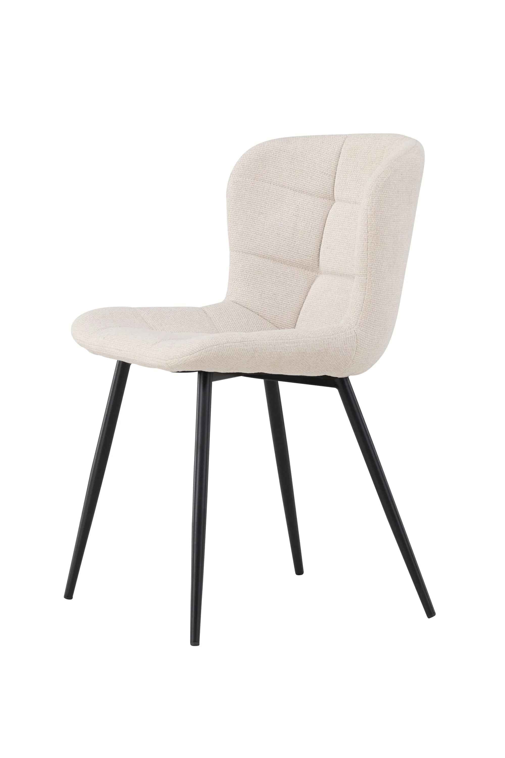 Der Lily Esszimmerstuhl vereint elegantes Design mit Komfort: Beige Polsterung, schwarze Beine, ideal für stilvolle Esszimmer.
