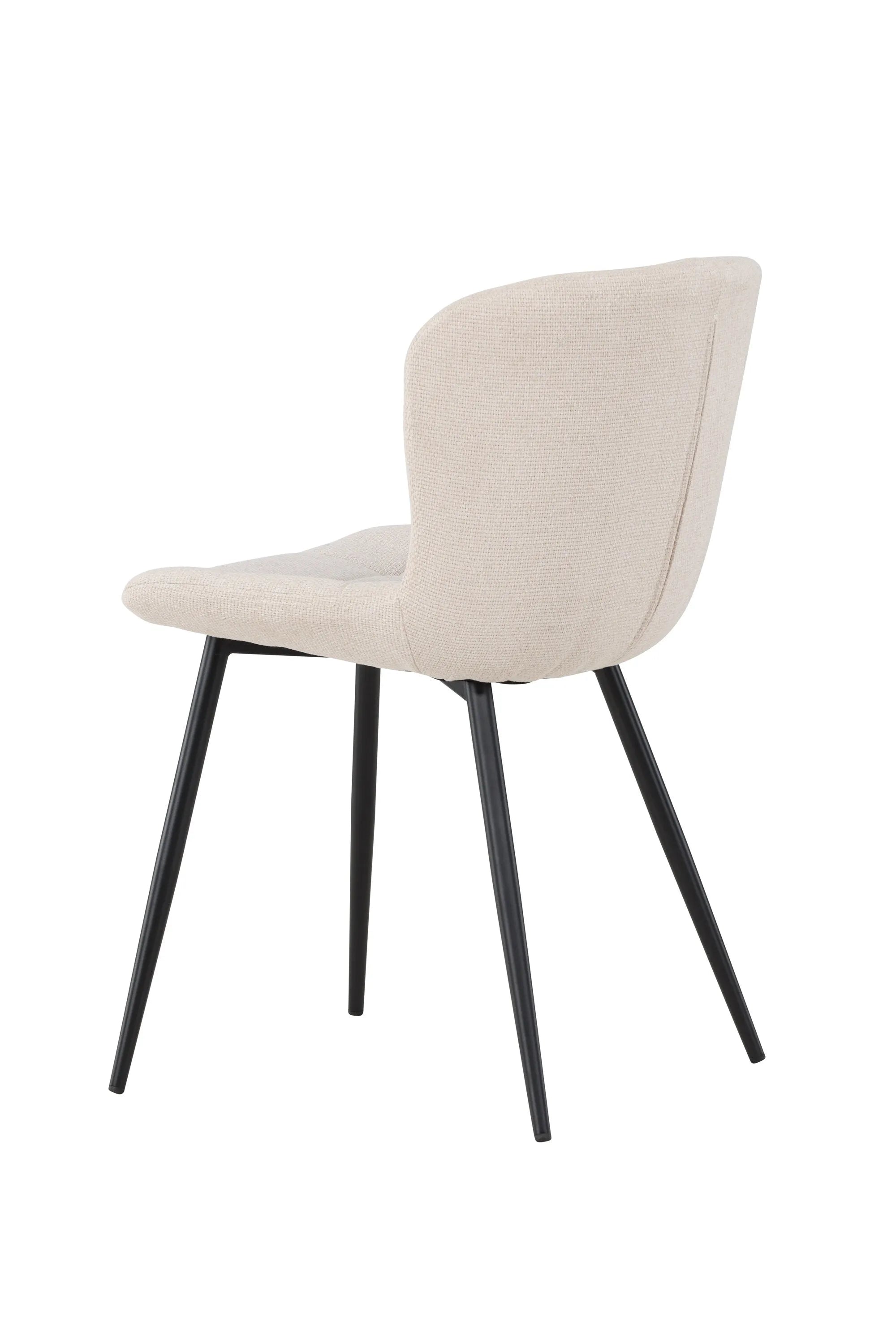 Der Lily Esszimmerstuhl vereint elegantes Design mit Komfort: Beige Polsterung, schwarze Beine, ideal für stilvolle Esszimmer.