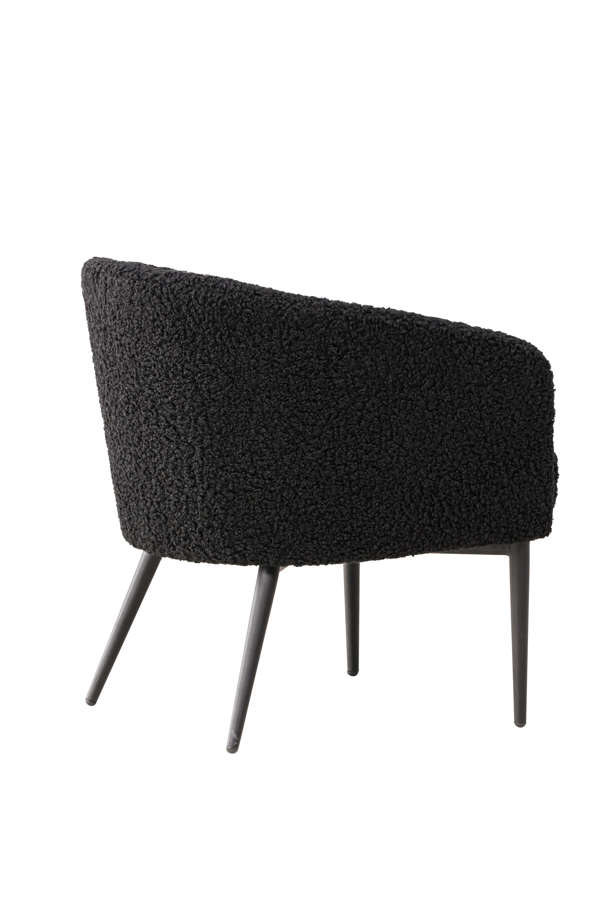 Der Fluffy Sessel von Venture Home: Kuscheliges Teddy-Material trifft auf modernes Design mit schwarzem Metallgestell.